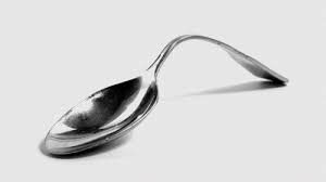 a spoon bent out of shape