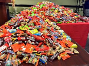 halloween candy spread out on a table