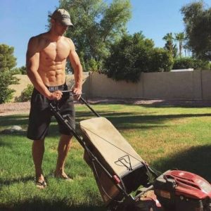 sexy guy mowing the lawn
