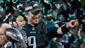nick roles celebrates winning super bowl lii with his daughter