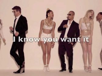the artists and models from the video for "blurred lines"