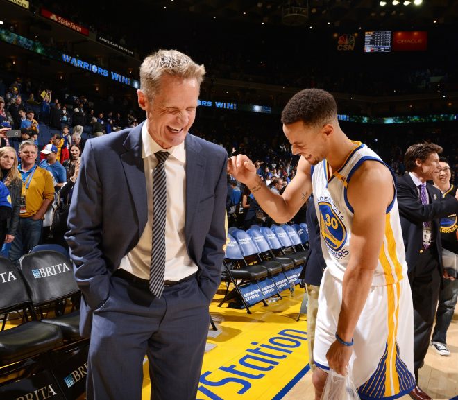 steve kerr and steph curry share a laugh