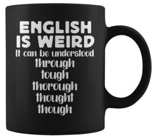 coffee mug that reads english is weird: it can be understood through tough thorough thought though--vocabulario en inglés